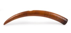 A tribal musical horn, carved ivory with remains of incised and pecked decoration. Very attractive antique patination, Nigerian origin,  61cm long