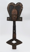 A tribal totem, carved wood, copper and shell with painted finish, African origin,&nbsp; ​​​​​​​85cm high&nbsp;
