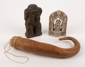 An African carved stone slave figure (17cm high), an Indian stone ornament (14cm high), together with a Papua New Guinea penis gourd (32cm high)
