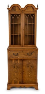 An English reproduction dwarf secretaire bookcase in the Georgian style, yew and boxwood, circa 1950s, retailed through George's of Melbourne, 186cm high, 65cm wide, 39cm deep