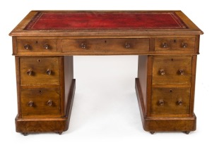 An antique English twin pedestal mahogany desk with red leather insert top, 19th century, 71cm x 123cm x 63cm