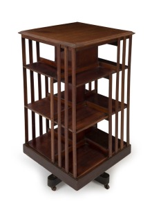 An antique English mahogany revolving bookcase with cross banded edge, 19th/20th century, 103cm x 51cm x 51cm