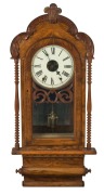 An antique American wall clock in walnut and parquetry case, eight day time and strike movement with Roman numerals, 19th century, 95cm high&nbsp;