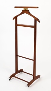 A vintage Italian valet stand, stained beech, mid 20th century, bearing maker's label "BREVETTATO, Made In Italy", 108cm high