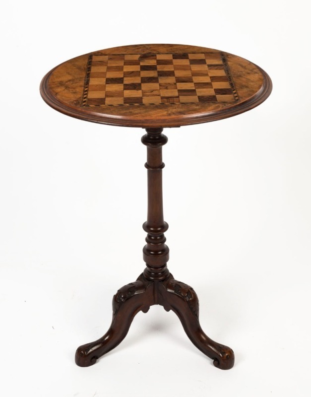 An antique English walnut games table, circa 1875, ​​​​​​​72cm high, 51cm diameter