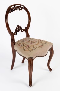 An antique English mahogany balloon back dining chair with tapestry upholstery, and footstool, circa 1875, the chair 88cm high