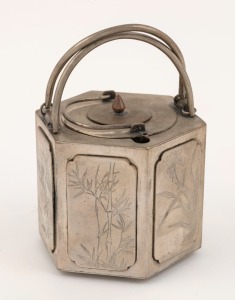 An antique Chinese silver ewer in hexagonal shaped warmer, Qing Dynasty, 19th century, 2 character seal mark to base, 13cm high overall