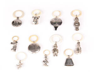 BABY RATTLES: Group of 10 silver & silver plated rattles including Walt Disney.