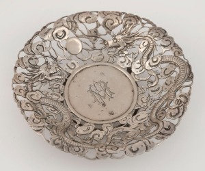 WOSHING antique Chinese export silver pierced bowl, with dragon decorations in clouds, 19th/20th century, three character seal mark to base with additional stamp "W.S.", 3cm high, 10cm wide, 58 grams