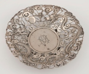 WOSHING antique Chinese export silver pierced bowl, with dragon decorations in clouds, 19th/20th century, three character seal mark to base with additional stamp "W.S.", 3cm high, 10cm wide, 58 grams