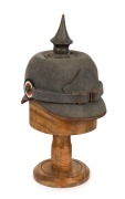 PICKELHAUBE, 22nd Regiment, field issue German helmet, World War 1 period, with accompanying timber hat stand, (2 items)