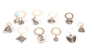 BABY RATTLES: Group of 10 Silver & silver plated rattles.