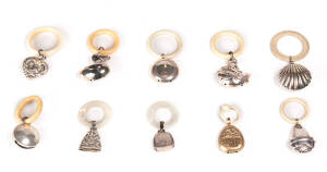 BABY RATTLES: Group of 10 Silver & silver plated rattles.