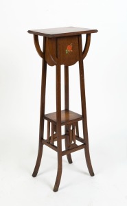An antique English Art Nouveau jardiniere stand, tapered oak frame with decorative fretted supports and rose flower transfer applied decal. 19th-20th century, 108cm high, 36cm wide, 31cm deep