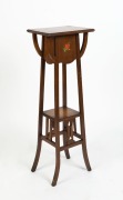 An antique English Art Nouveau&nbsp;jardiniere stand, tapered oak frame with decorative fretted supports and rose flower transfer applied decal. 19th-20th century, 108cm high, 36cm wide, 31cm deep