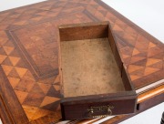 An antique Australian cedar games-top centre table, inlaid with Australian and New Zealand timbers including totara, musk, myrtle, kauri and hoop pine, blackwood and casuarina, New South Wales origin, circa 1870, ​​​​​​​75cm high, 87cm wide, 71cm deep - 2