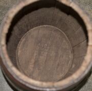 An antique coopered beer barrel with green painted finish and iron strapping, stamped "TOOTH", 19th century,  44cm high, 33cm wide - 8