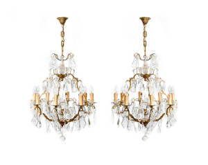 CHANDELIERS: A pair of early 20th century gilt metal & crystal hanging lights. Height 70cm, width 62cm each