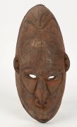 Two tribal masks, carved wood and fibre with remains of earth pigment decoration, Papua New Guinea origin, collected by John Leon Pender, an Australian ex-pat living in New Guinea in the 1930s and 40s who returned to Australia in 1942 upon the Japanese in - 2