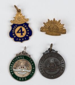 Sports awards fobs incorporating the "Rising Sun": 1921 Brigade Sports Bugle Band; 1922 Australian Senior Cadets Recreational Training 40yds; 1922 4th Brigade Sports Flag Race; also one mini size Rising Sun sweetheart badge. (4 items).