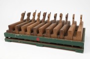 Sold at Auction: A quantity of hand tools including Stanley wood chisels,  brass plumb bobs, Titan chisels and steel gauge markers, (15 item total),  the largest chisel 27cm long.