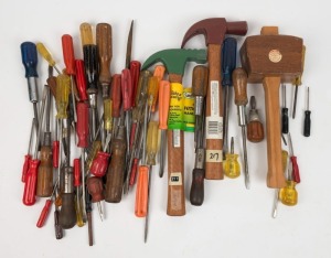 A selection of assorted screwdrivers including turner type, along with two claw hammers and mallet, the largest screwdriver 39cm long.