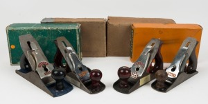 Four vintage boxed hand planes including, Stanley No.3 plane, (Australian model) Flacon No.4 smoothing plane, Turner No.4 smoothing plane and a Carter 4½ inch smoothing plane. The largest box 28cm long.