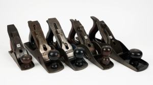 A selection of five vintage hand planes including, Stanley No.10 and quarter rabbet plane, Stanley Bailey No.5 and half jack plane, Stanley No.2 and two Carter rebate planes. The largest 38cm long.