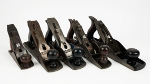 A selection of five vintage hand planes including, Stanley No.10 and quarter rabbet plane, Stanley Bailey No.5 and half jack plane, Stanley No.2 and two Carter rebate planes. The largest 38cm long.