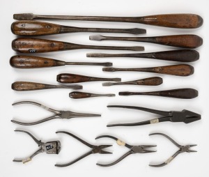 A fine selection of hand tools including (12) unbreakable style handle screw drivers, various manufacturers, and (6) assorted pliers American and Swedish, (18 items total), the largest screwdriver 41cm long.