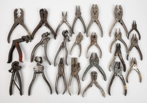 A large selection of hand tools including (5) saw tooth setting tools, and (18) pairs of assorted pliers and cutters various American manufactures, (23 items total), ​​​​​​​the largest 19cm long. 
