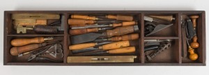 TOOL TRUNK AND TOOLS. A fine collection of antique and vintage hand tools and assorted planes housed in a carpenter's trunk, 19th/20th century