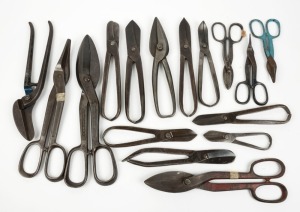 A large assortment of workshop shears from makers such as Crescent, J. Cousins & Sons of Sheffield, and Robin; also a range of curved tin snips and straight edge shears, (15 items total), the largest 36cm long.