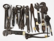 A large selection of metal pliars, C-clamps, wrenches and ratchets, various makes and models, (18 items total), the largest 32cm long.