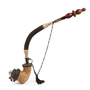 An impressive antique pipe with meerschaum bowl mounted in silver, with turned ivory fittings, horn mouthpiece adorned with jade spacer, inlaid with gold, 19th century, 70cm long
