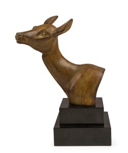 An Art Deco statue of a deer head, patinated bronze, mounted on black slate base, circa 1930, 27.5cm high