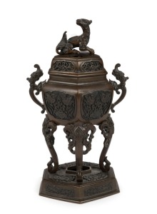 A Chinese bronze censer adorned with mythical creature, 19th/20th century, 32cm high