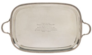 An English sterling silver serving tray, with inscription "Presented To Robert J. Elliston Esq. J.P. By The Directors Of Hazell. Watson & Viney. Ltd. As A Mark Of Their Appreciation Of His 31 Years Association With The Company. 1889-1920", made in Sheffie