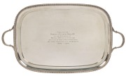 An English sterling silver serving tray, with inscription "Presented To Robert J. Elliston Esq. J.P. By The Directors Of Hazell. Watson & Viney. Ltd. As A Mark Of Their Appreciation Of His 31 Years Association With The Company. 1889-1920", made in Sheffie
