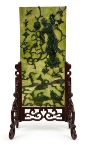 An impressive Chinese carved jade table screen, mounted in carved rosewood stand, Republic period, 35.5cm high overall