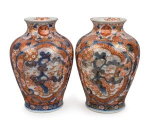 A pair of antique Japanese Imari porcelain vases, Meiji period, 19th century, red seal mark to bases, 19cm high