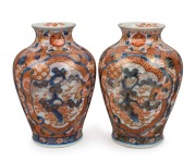 A pair of antique Japanese Imari porcelain vases, Meiji period, 19th century, red seal mark to bases, 19cm high