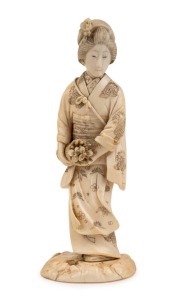 An antique Japanese carved ivory statue of a Geisha, Meiji period, 19th century, remains of paper label to base, ​​​​​​​16.5cm high