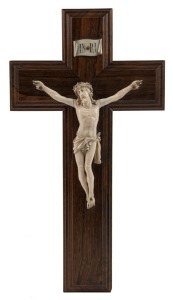 An antique carved ivory and rosewood Corpus Christi, 19th century, 39cm high