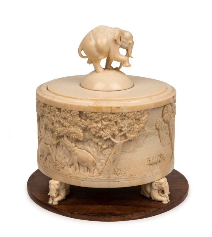 An antique Indian carved ivory casket on timber base, 19th century, ​​​​​​​16cm high, 15cm wide