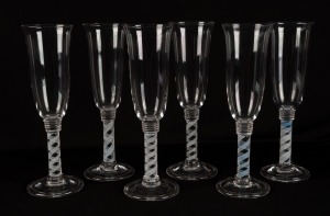 A set of six champagne flutes with air twist stems, early to mid 20th century, 25.5cm high