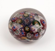 An antique millefiori glass paperweight, 19th century, ​​​​​​​4cm high, 6.5cm diameter