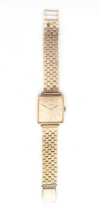 WRISTWATCH: a Gentleman's 9ct gold wristwatch on 9ct gold bracelet.Total weight 50g.