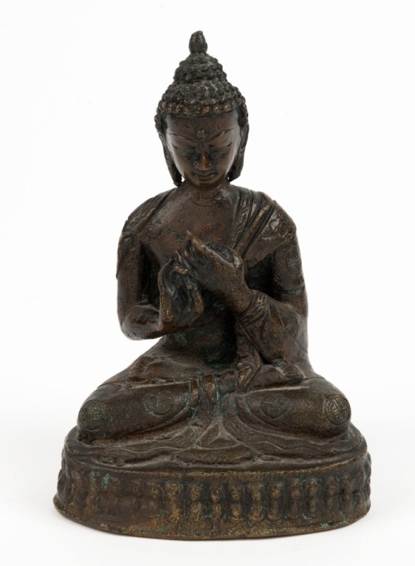 An antique Tibetan bronze seated Buddha statue, 19th/20th century, ​​​​​​​12cm high