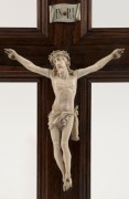 An antique carved ivory and rosewood Corpus Christi, 19th century, ​​​​​​​39cm high - 2